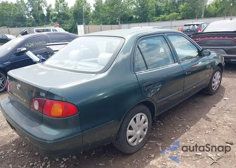 2001 Toyota Corolla Ce z USA, uszkodzony, nr VIN 2T1BR12E81C475853